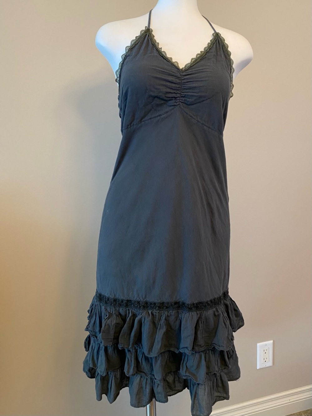 Unknown brand halter style grey dress with shirred back and ruffled hem. Size XS
